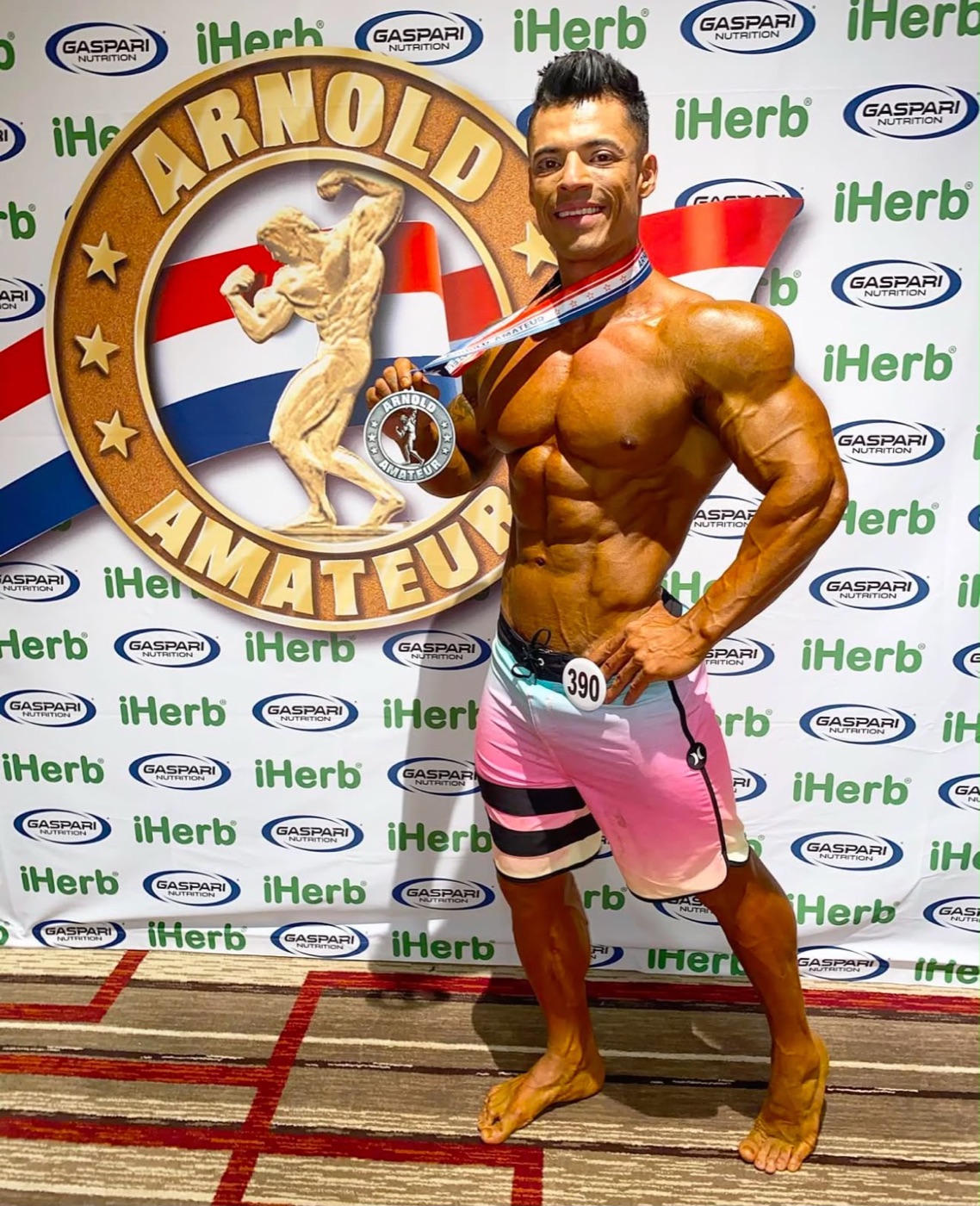 Gio Melchor with a medal at the Arnold Amateur